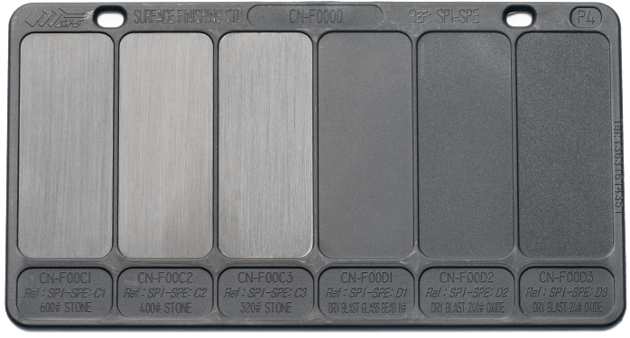 Injection molding texture board displaying multiple surface finishes for part design