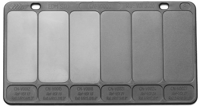 Injection molding texture board displaying multiple surface finishes for part design